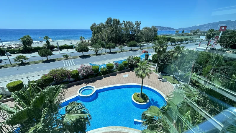1+1 Apartment for Sale Right on the Sea in Kestel