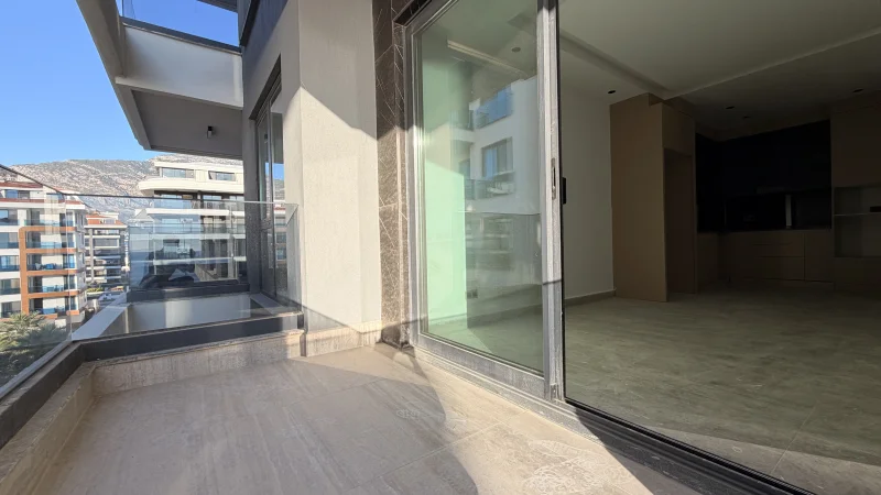 1+1 Wohnung mit Meerblick im Küçüker Palazzo