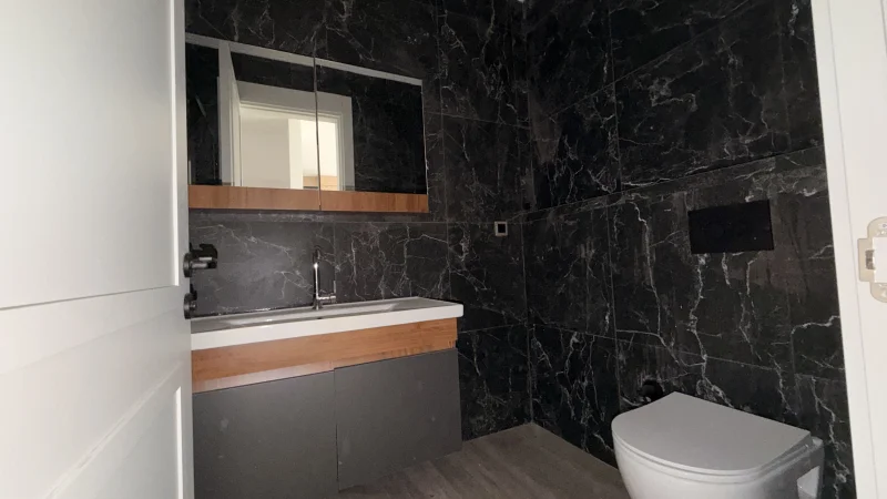 1+1 Wohnung mit Meerblick im Küçüker Palazzo