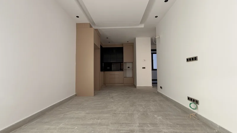 1+1 Wohnung mit Meerblick im Küçüker Palazzo