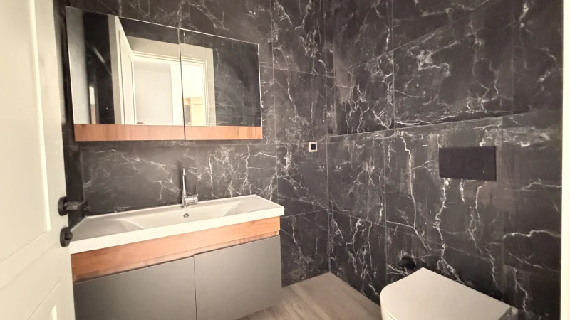 1+1 Wohnung mit Meerblick im Küçüker Palazzo