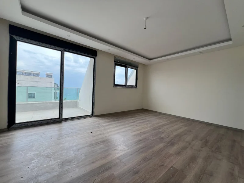 Duplexlejlighed 5+1 til salg direkte ved havet i Kestel, Alanya